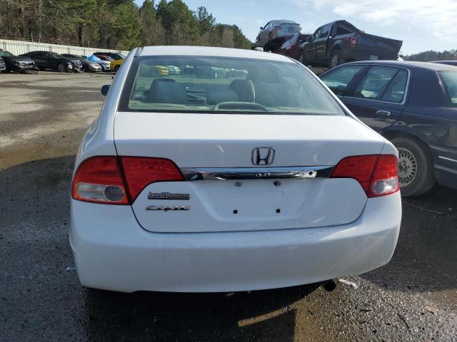 Photo 6 from auction – 2011 HONDA CIVIC LX with VIN 19XFA1F50BE032831