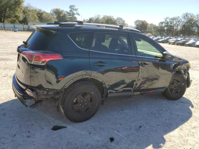 Photo 3 from auction – 2018 TOYOTA RAV4 LE with VIN JTMZFREV8JD110724