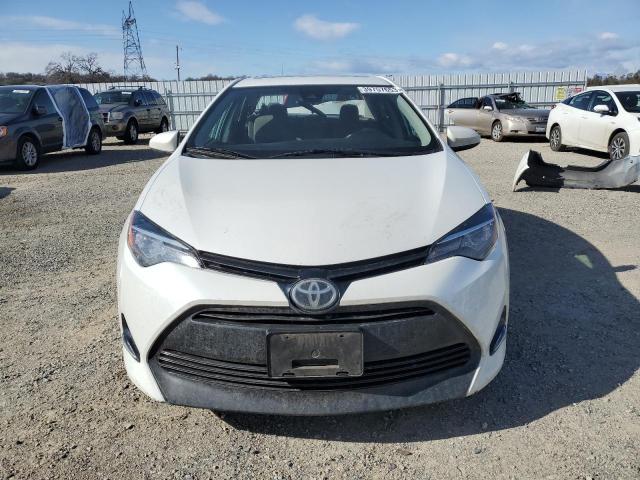 Photo 5 from auction – 2017 TOYOTA COROLLA LE with VIN 5YFBPRHE2HP619418