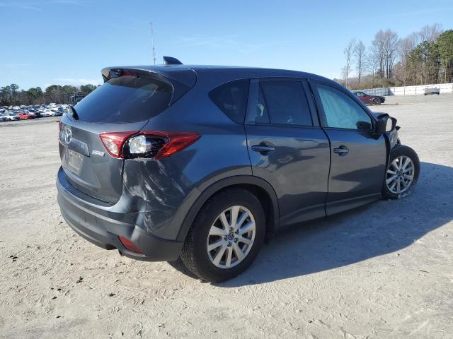 Photo 3 from auction – 2013 MAZDA CX-5 TOURI with VIN JM3KE4CE2D0133753