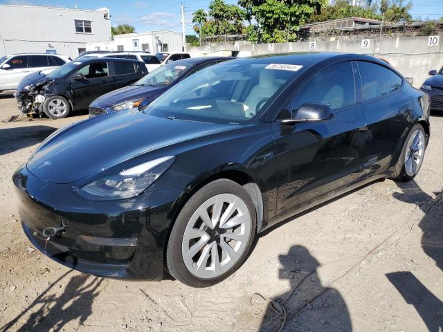 TESLA MODEL 3 2021 with VIN 5YJ3E1EA9MF989672 - Photo from auction