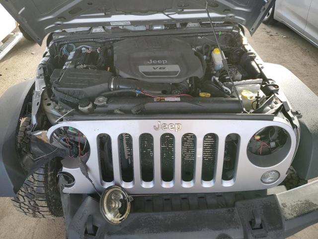 Photo 11 from auction – 2014 JEEP WRANGLER U with VIN 1C4BJWDG3EL149914
