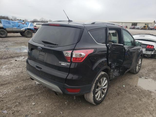 Photo 3 from auction – 2017 FORD ESCAPE TIT with VIN 1FMCU9JD9HUD15029