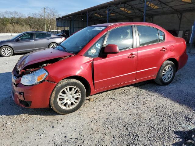 SUZUKI SX4 LE 2012 with VIN JS2YC5A30C6301097 - Photo from auction