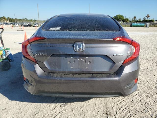 Photo 6 from auction – 2018 HONDA CIVIC LX with VIN 19XFC2F58JE002006