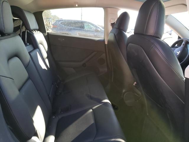 Photo 10 from auction – 2022 TESLA MODEL Y with VIN 7SAYGDEE2NF427637