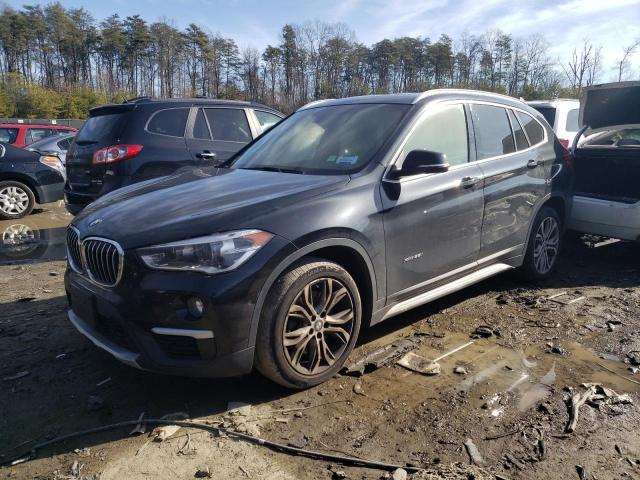 BMW X1 XDRIVE2 2017 with VIN WBXHT3Z33H4A56954 - Photo from auction