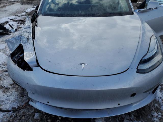 Photo 11 from auction – 2018 TESLA MODEL 3 with VIN 5YJ3E1EB9JF065172