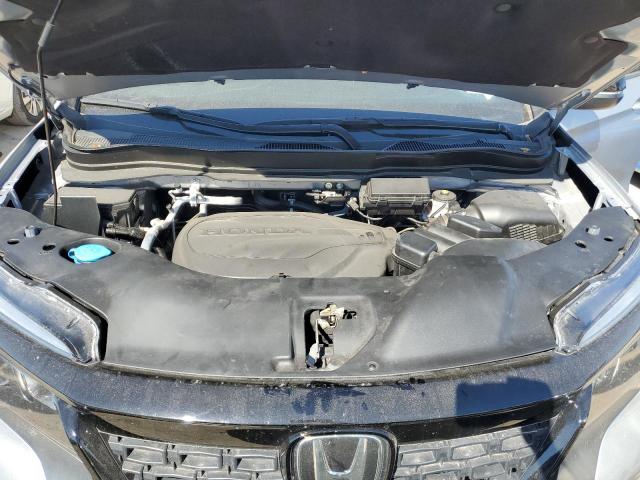 Photo 12 from auction – 2021 HONDA PASSPORT E with VIN 5FNYF7H51MB008559
