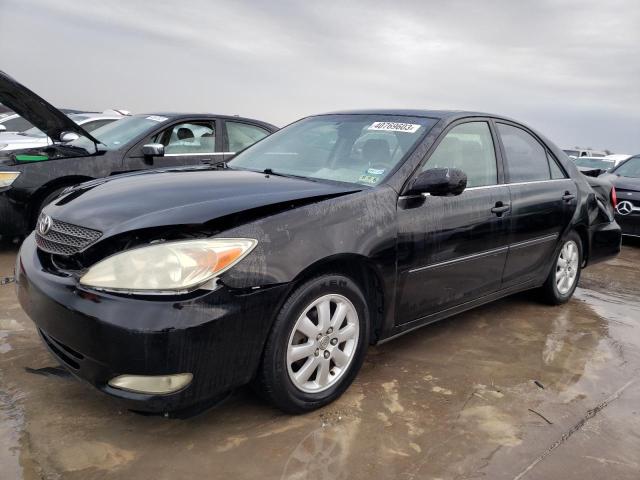 TOYOTA CAMRY LE 2003 with VIN JTDBE32K930233356 - Photo from auction