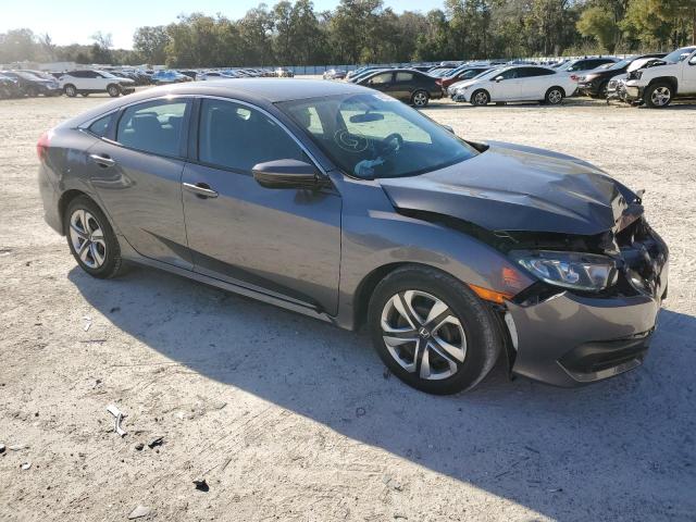 Photo 4 from auction – 2018 HONDA CIVIC LX with VIN 2HGFC2F5XJH601205