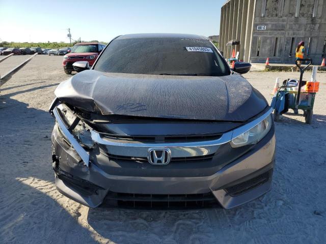 Photo 5 from auction – 2018 HONDA CIVIC LX with VIN 19XFC2F58JE002006