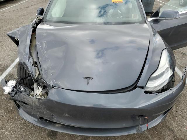 Photo 11 from auction – 2019 TESLA MODEL 3 with VIN 5YJ3E1EA8KF400382