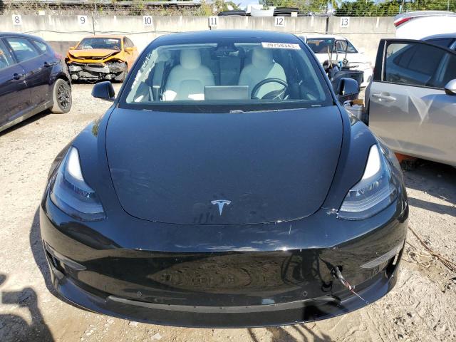 Photo 5 from auction – 2021 TESLA MODEL 3 with VIN 5YJ3E1EA9MF989672