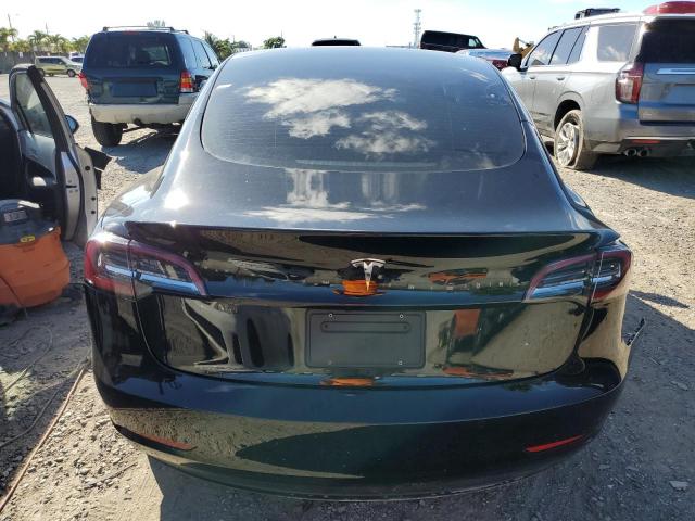 Photo 6 from auction – 2021 TESLA MODEL 3 with VIN 5YJ3E1EA9MF989672