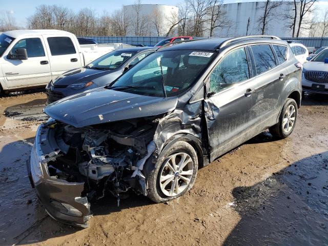 FORD ESCAPE SE 2018 with VIN 1FMCU9GD5JUC29696 - Photo from auction