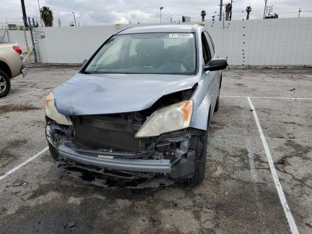 Photo 5 from auction – 2011 HONDA CR-V LX with VIN JHLRE4H32BC003355