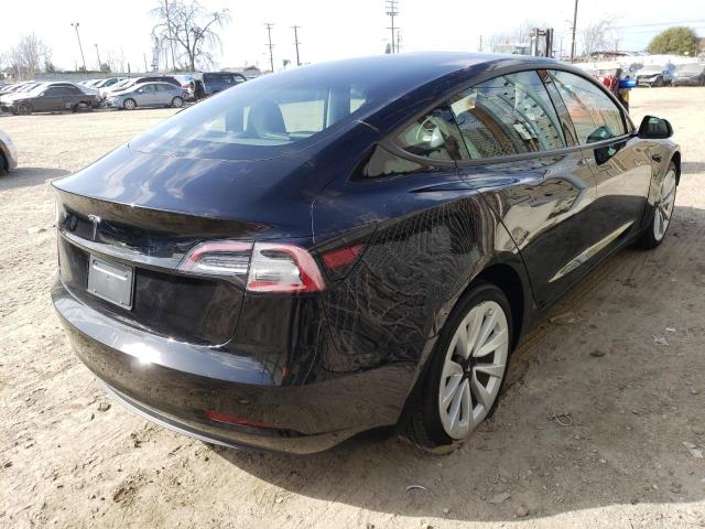 Photo 3 from auction – 2021 TESLA MODEL 3 with VIN 5YJ3E1EA0MF069977