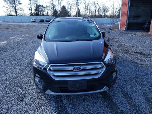 Photo 5 from auction – 2018 FORD ESCAPE SE with VIN 1FMCU9GD8JUD25337
