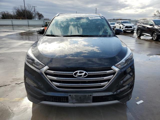 Photo 5 from auction – 2016 HYUNDAI TUCSON LIM with VIN KM8J33A28GU026986