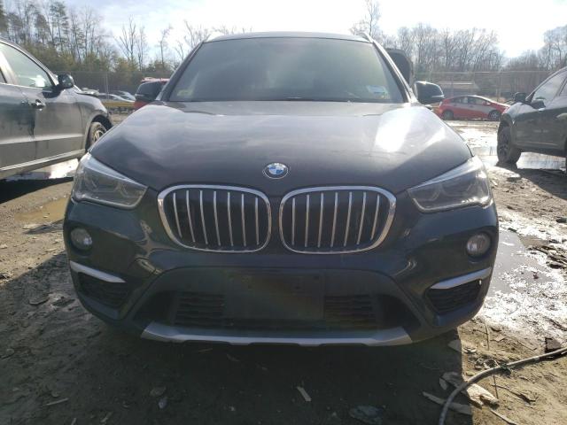 Photo 5 from auction – 2017 BMW X1 XDRIVE2 with VIN WBXHT3Z33H4A56954