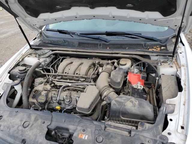 Photo 11 from auction – 2015 FORD TAURUS SEL with VIN 1FAHP2E87FG207256