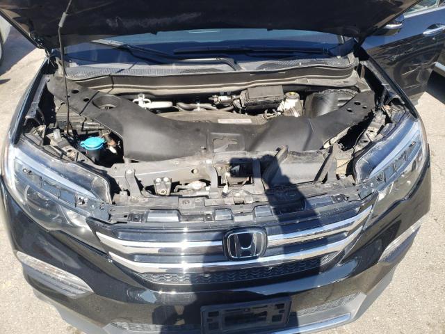 Photo 12 from auction – 2017 HONDA PILOT TOUR with VIN 5FNYF6H9XHB096451