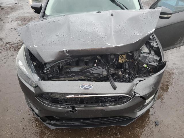 Photo 11 from auction – 2016 FORD FOCUS SE with VIN 1FADP3F21GL258100