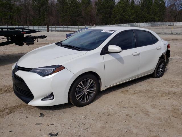 TOYOTA COROLLA L 2018 with VIN 5YFBURHE5JP785236 - Photo from auction