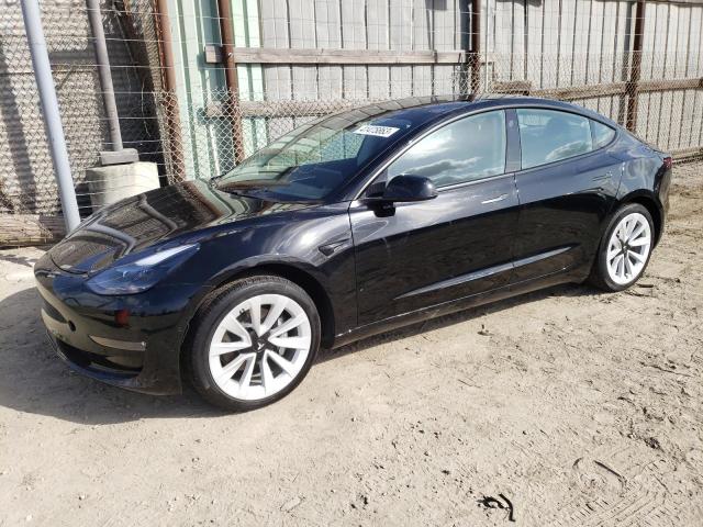 TESLA MODEL 3 2021 with VIN 5YJ3E1EA0MF069977 - Photo from auction