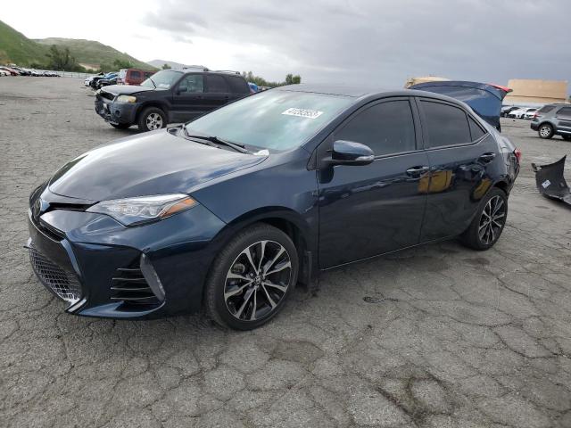 TOYOTA COROLLA L 2018 with VIN 5YFBURHE2JP803708 - Photo from auction