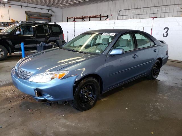 TOYOTA CAMRY LE 2004 with VIN 4T1BF32K04U567438 - Photo from auction