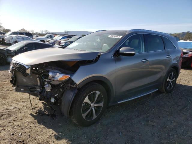 KIA SORENTO EX 2016 with VIN 5XYPH4A55GG104738 - Photo from auction