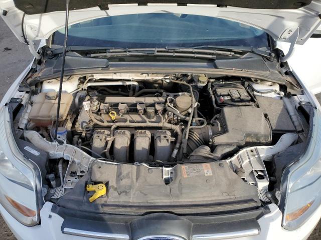 Photo 11 from auction – 2014 FORD FOCUS SE with VIN 1FADP3F27EL390825