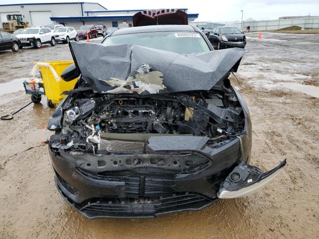 Photo 5 from auction – 2016 FORD FOCUS SE with VIN 1FADP3K26GL272063