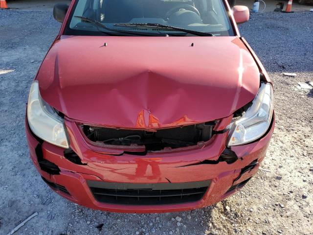 Photo 11 from auction – 2012 SUZUKI SX4 LE with VIN JS2YC5A30C6301097