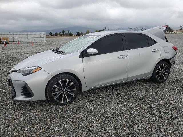 TOYOTA COROLLA L 2019 with VIN 5YFBURHE2KP901266 - Photo from auction
