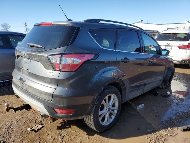 Photo 3 from auction – 2018 FORD ESCAPE SE with VIN 1FMCU9GD5JUC29696
