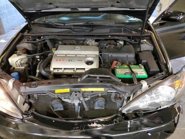 Photo 11 from auction – 2003 TOYOTA CAMRY LE with VIN 4T1BF30KX3U051735