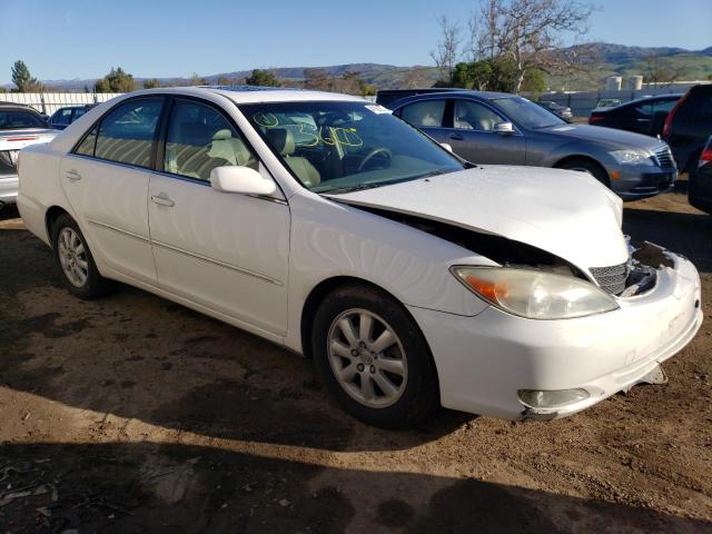 Photo 4 from auction – 2004 TOYOTA CAMRY LE with VIN JTDBF30K440153013