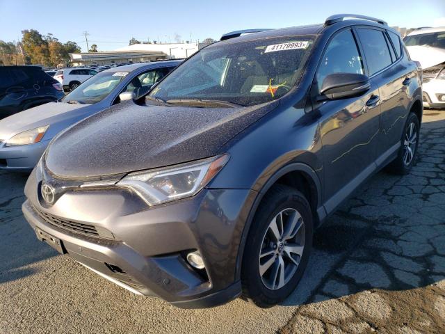 TOYOTA RAV4 XLE 2016 with VIN 2T3RFREV9GW464506 - Photo from auction