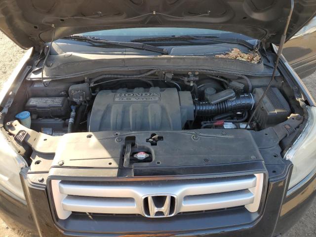 Photo 12 from auction – 2006 HONDA PILOT EX with VIN 2HKYF18516H508884