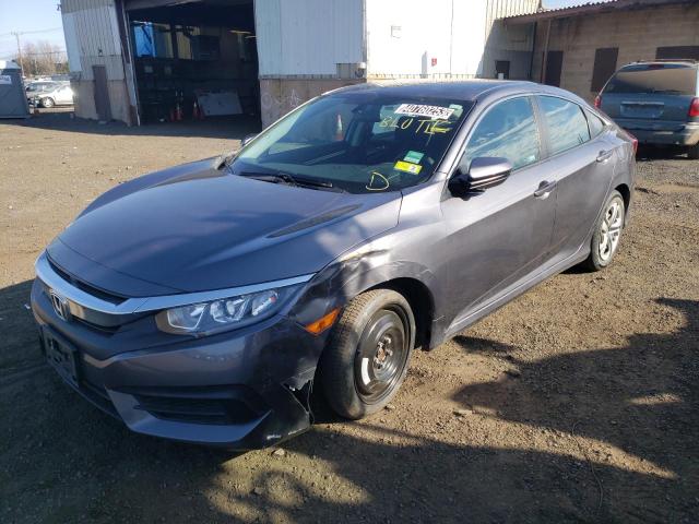 HONDA CIVIC LX 2018 with VIN 19XFC2F50JE204807 - Photo from auction