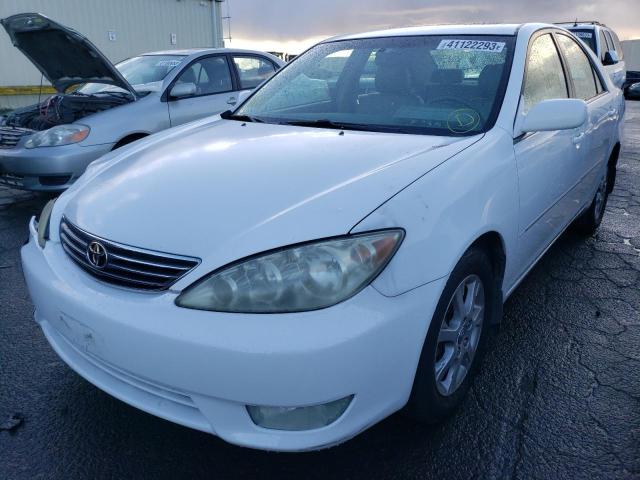 TOYOTA CAMRY LE 2005 with VIN JTDBF30KX50162980 - Photo from auction