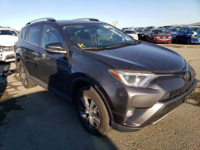 Photo 4 from auction – 2016 TOYOTA RAV4 XLE with VIN 2T3RFREV9GW464506