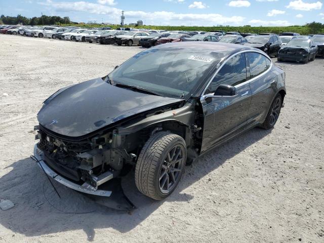 TESLA MODEL 3 2017 with VIN 5YJ3E1EA8HF001142 - Photo from auction
