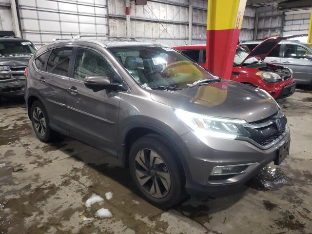 Photo 4 from auction – 2016 HONDA CR-V with VIN 5J6RM4H99GL015198