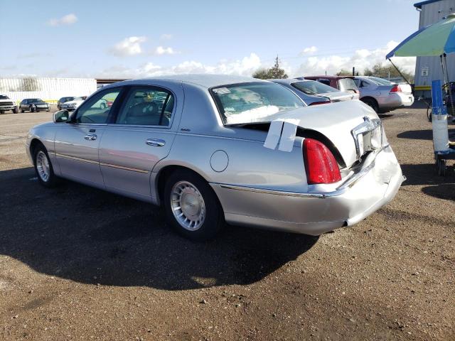Photo 2 from auction – 2001 LINCOLN TOWN CAR E with VIN 1LNHM81W11Y608536