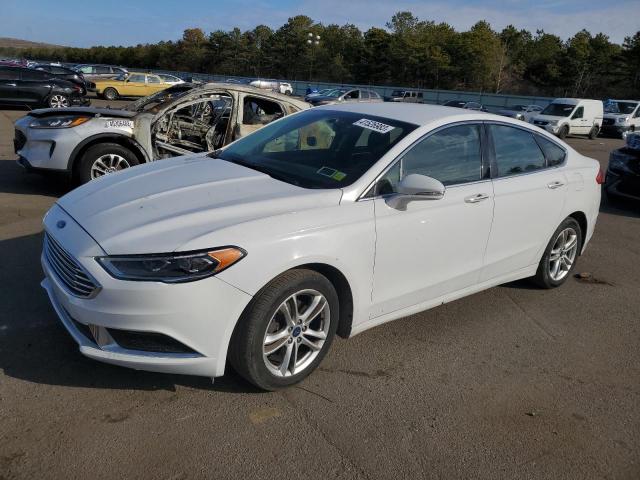 FORD FUSION SE 2018 with VIN 3FA6P0HD5JR144602 - Photo from auction