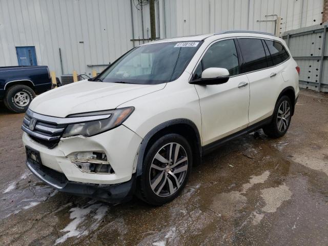 HONDA PILOT TOUR 2016 with VIN 5FNYF5H90GB014168 - Photo from auction